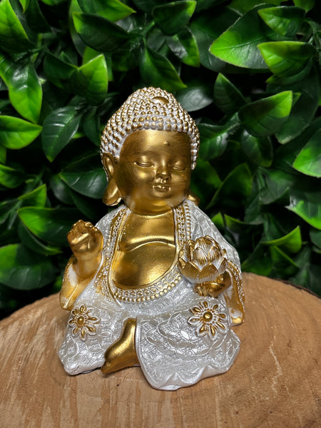 Sitting Buddha in White Pearlized & Gold holding lotus