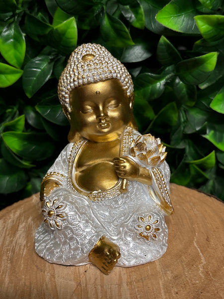 Sitting Buddha in White Pearlized & Gold holding lotus