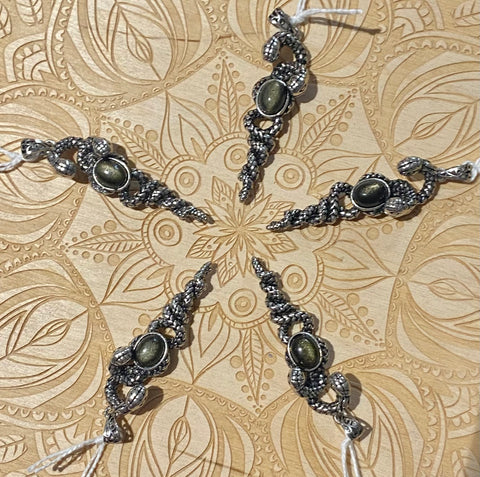 Gold sheen snake pendant