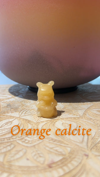 Pooh orange calcite carving