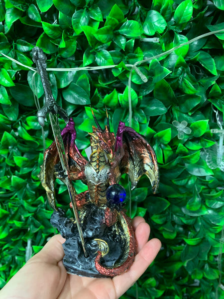 Dragon and sword statue
