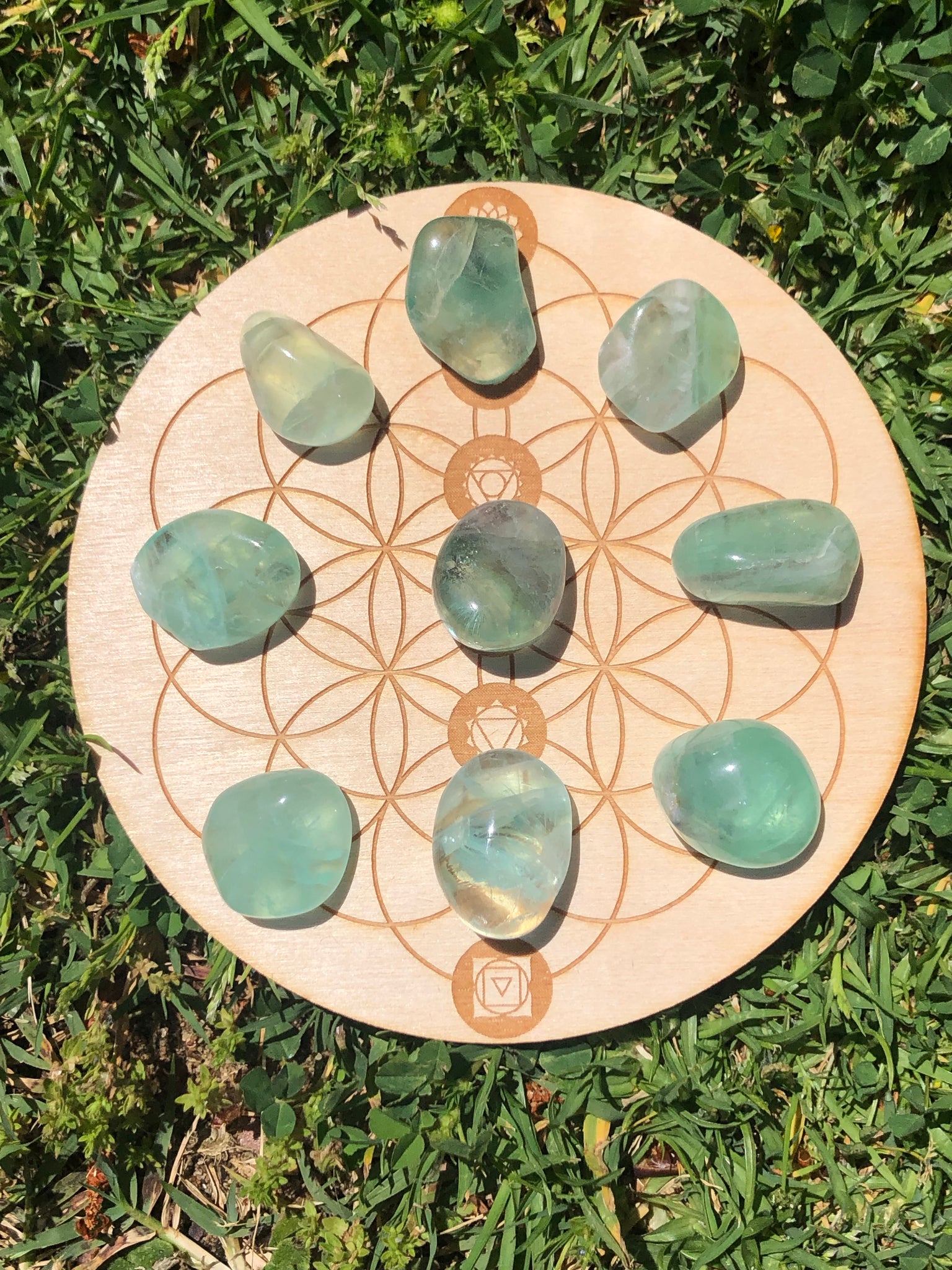 Green fluorite tumbles