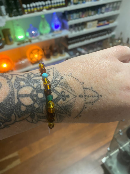 Amber scattered chakra stone drawstring bracelet